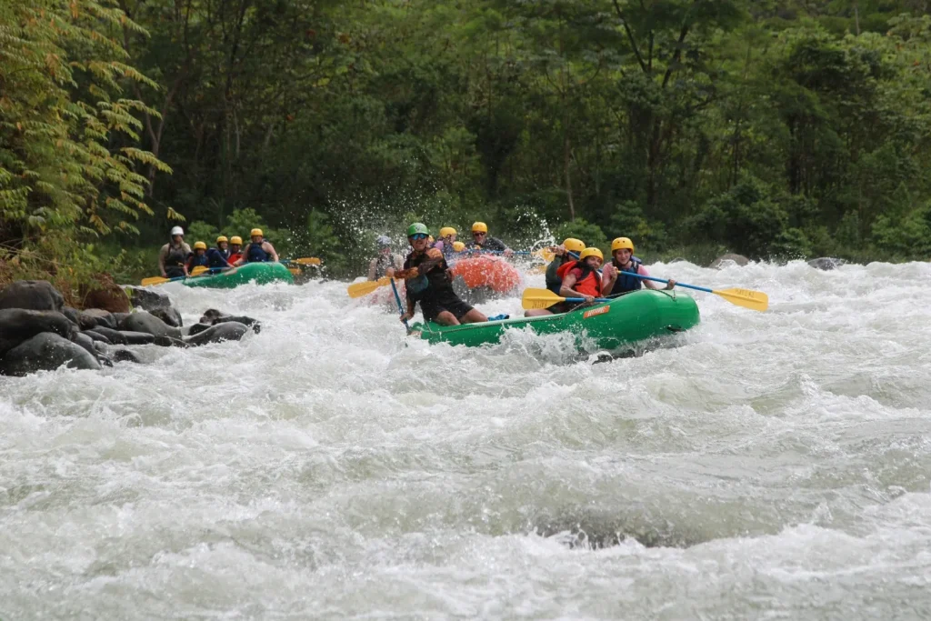 Group of rafts running the Savegre rapids